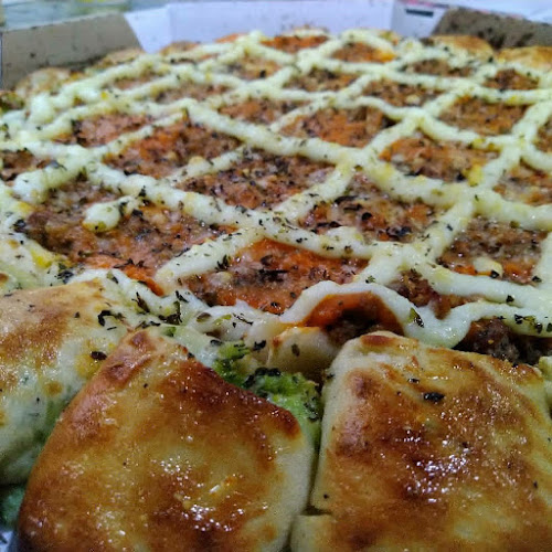 Pizzaria e Esfiharia Ticos Braganca